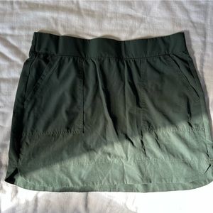 Olive green golf skirt with built in shorts